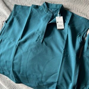 Brand new never worn Figs Women’s Rafaela Scrub top size XS in Caribbean Blue